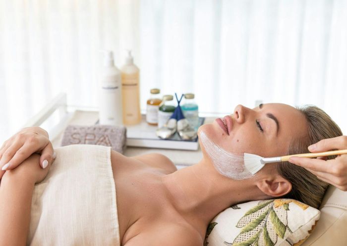 Woman having skin treatment at Sofitel Sydney, Darling Harbour