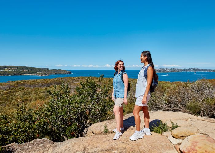Friends enjoying stunning coastal views of Sydney Harbour from Dobroyd Head, Balgowlah Heights