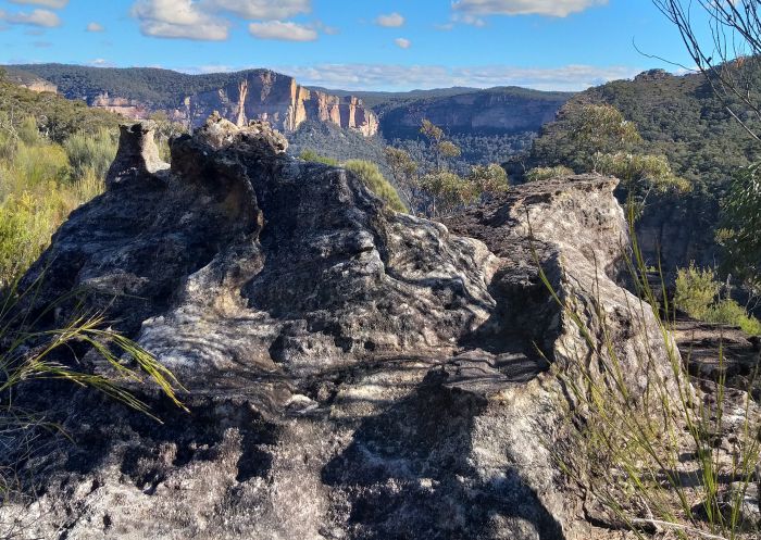 Rock formation on Rigby Hill, with Grose Valley views in the background, in the Blackheath area of Blue Mountains National Park, Mount Wilson