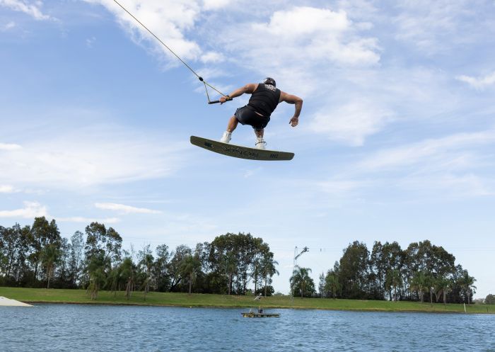 Cables Wake Park, Penrith Man enjoying a wake boarding experience at Cables Wake Park, Penrith