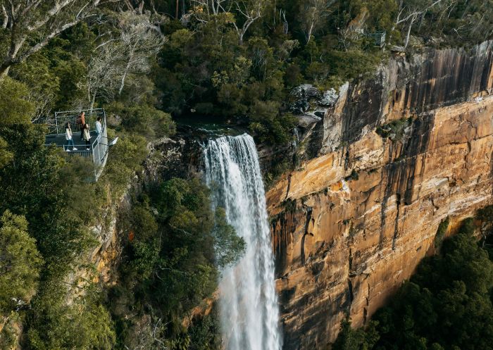 Fitzroy Falls, Kangaroo Valley Aerial view of people standing at the viewpoint above Fitzroy Falls, Kangaroo Valley