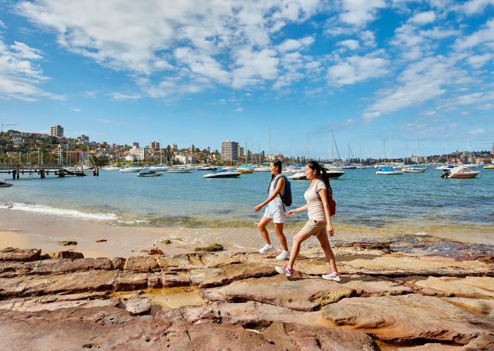 Friends enjoying a walk along Forty Baskets Beach, Balgowlah