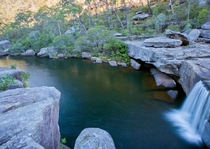 Waterfall cascading on the Jingga walking track in Dharawal National Park, Helensburgh