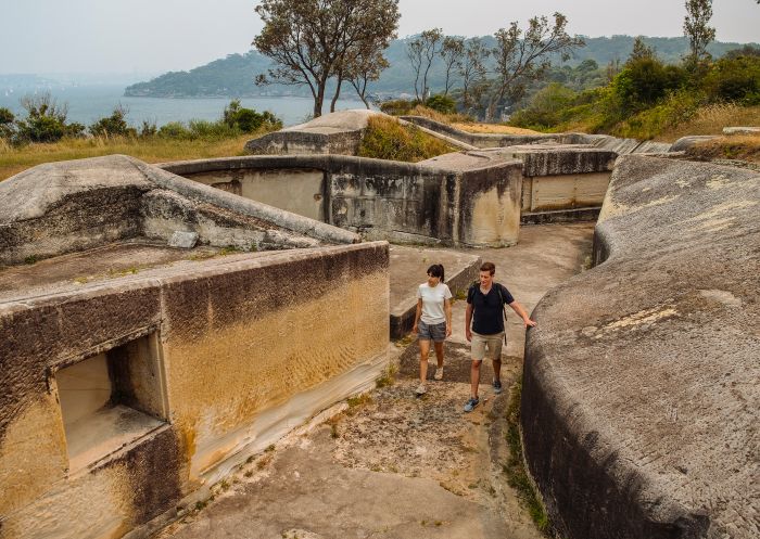 Couple exploring the historic fort and military relics at Middle Head in Mosman, Sydney North