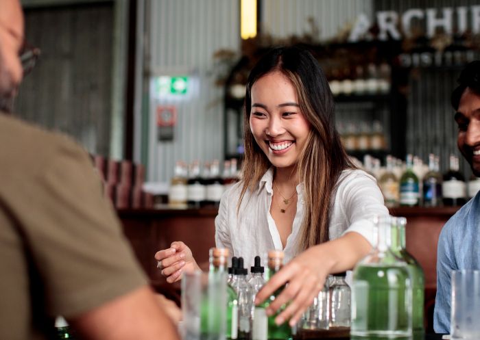 Couple enjoying a gin masterclass experience at Archie Rose Distilling Co., Rosebery