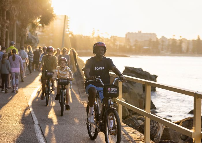 Group enjoying a bike ride with Bonza Bike Tours, Manly
