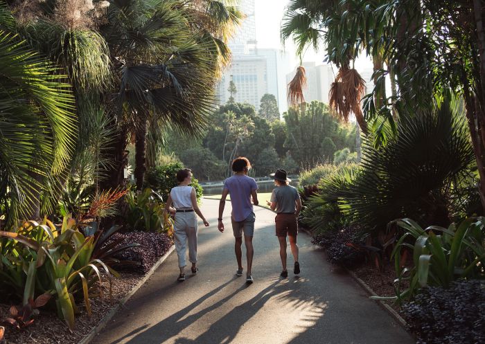 Friends enjoying a walk through Royal Botanic Garden, The Domain