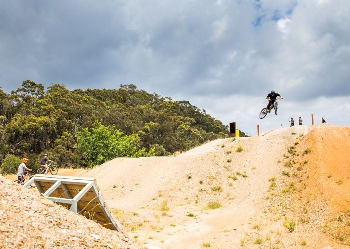 Mountain bike rider enjoying a day on the tracks at Bare Creek Bike Park, Belrose