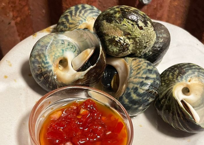 Dish of snails with native chilli, Bush