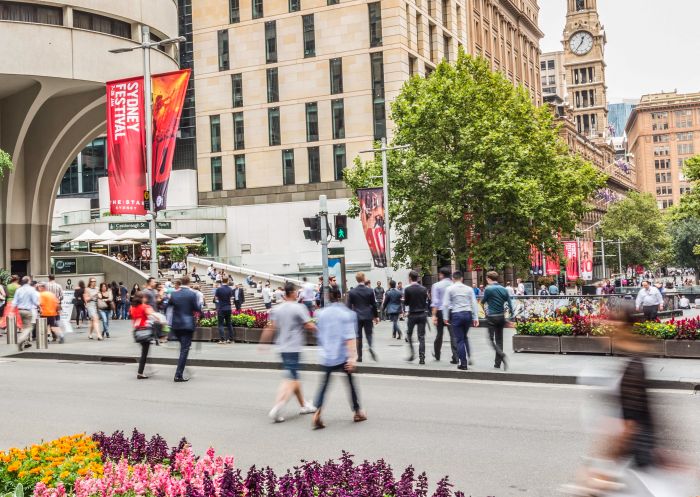 People crossing the street at Martin Place, Sydney CBD