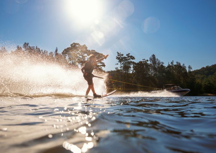 Boy waterskiing on Hawkesbury River near Wisemans Ferry