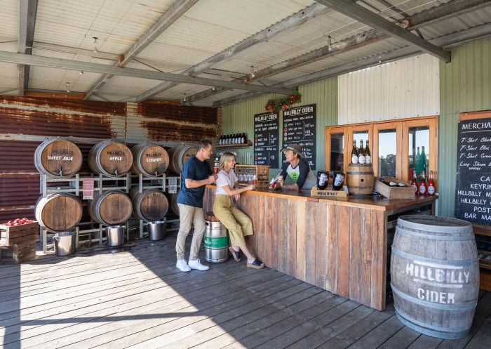 Couple enjoying tastings at Hillbilly Cider, Bilpin