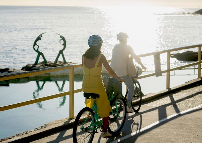 Couple enjoying a self-guided tour of Manly with Manly Bike Tours.
