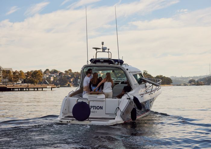 People exploring harbour beaches, waterfront mansions and icons with Sydney Luxury Cruise, Sydney