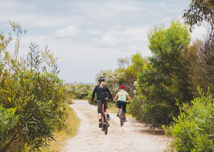 Women enjoying a day on the bike track at Manly Dam, Manly Vale