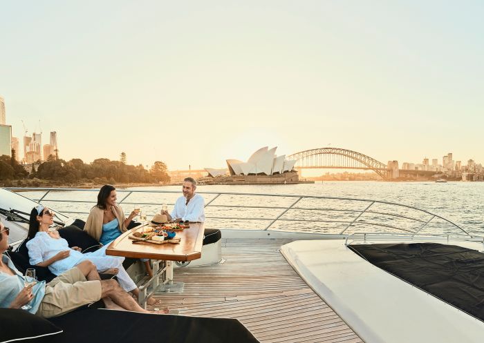 Ghost 2 Super Yacht, Sydney Harbour Friends enjoying drinks and snacks on board the Ghost 2 Super Yacht, Sydney Harbour