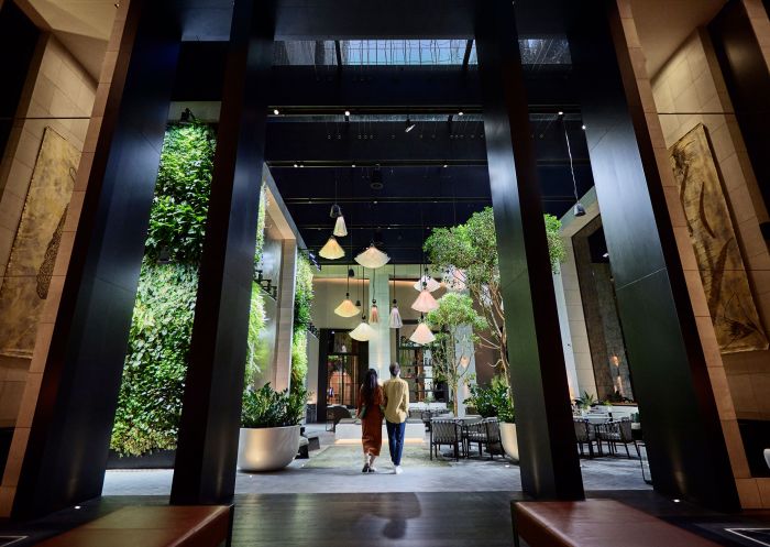 Capella, Sydney Couple walking through the foyer at Capella, Sydney