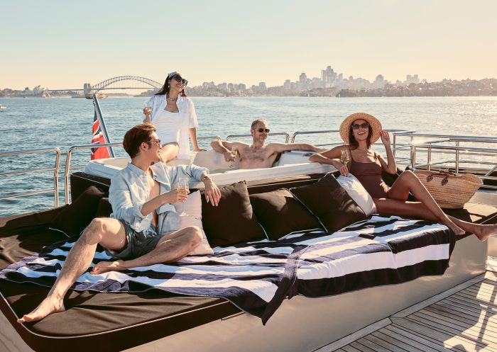 Ghost 2 Super Yacht, Sydney Harbour Friends enjoying drinks and a spa onboard Ghost 2 Super Yacht, Sydney Harbour