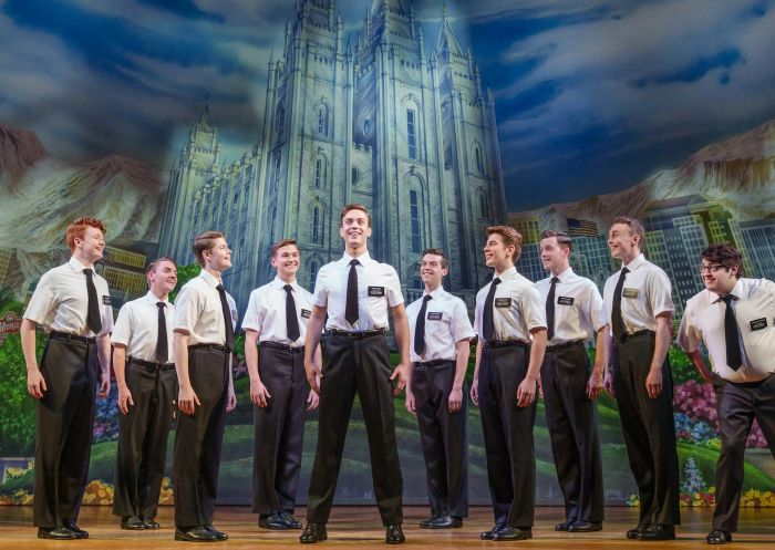Cast performing on stage during the The Book of Mormon at the Capitol Theatre, Haymarket