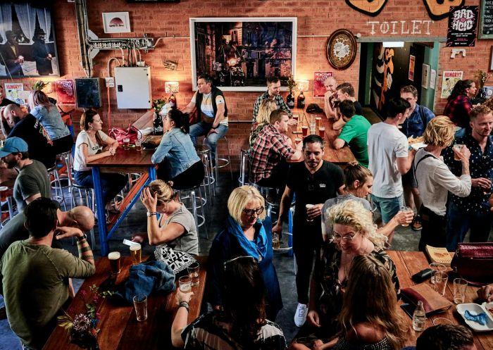 People enjoying craft beer at Young Henrys bar and brewery, Newtown