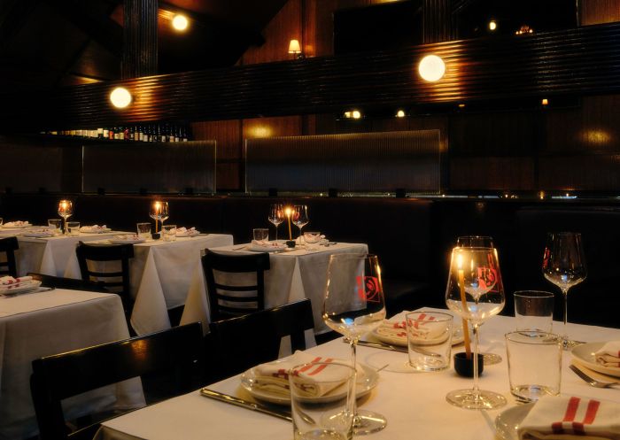 Bistro Grenier, Newtown Crisp white tablecloths and mood lighting at Bistro Grenier, Newtown