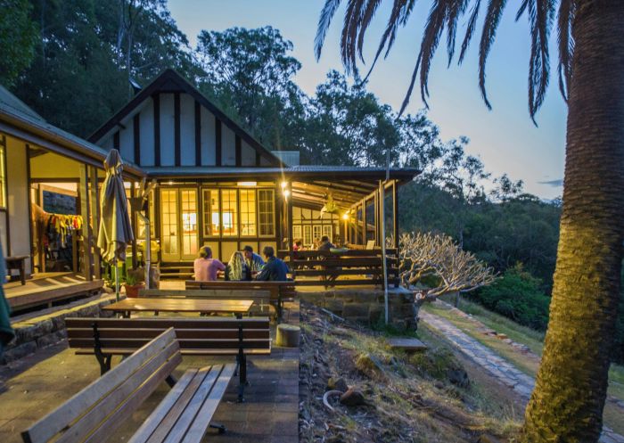 People enjoying the view from the outdoor balcony at YHA Pittwater Eco, Church Point - Credit: YHA NSW YHA Pittwater Eco, Church Point