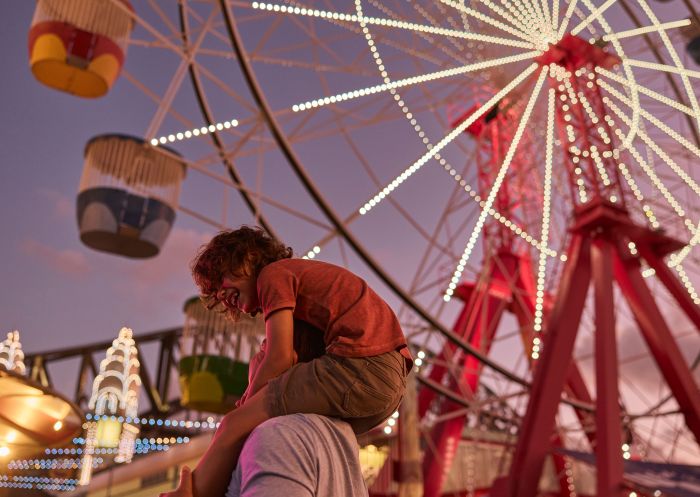 Family enjoying a day out at Luna Park Sydney, Milsons Point