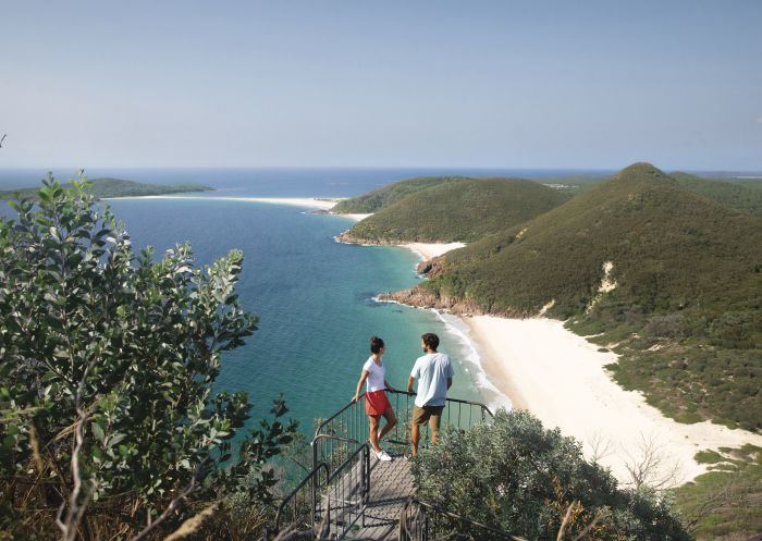 Couple enjoying the coastal views, Tomaree Head Summit Walk, Port Stephens, Hunter