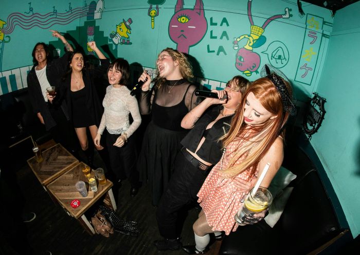 Friends singing to Karaoke, Goros, Surry Hills - Credit: Goros