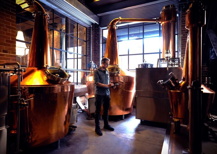 Worker checking distilling, Hickson House Distilling Co, The Rocks, Sydney - Credit: Hickson House Distilling Co. 