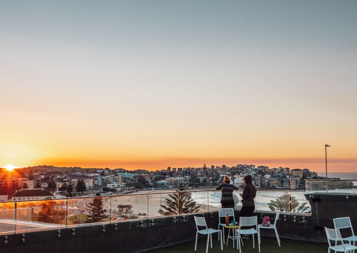 Wake Up! Bondi Beach, Bondi Beach - Credit: Wake Up! Bondi Beach Two people watching sunrise on rooftop, Wake Up! Bondi Beach, Bondi Beach - Credit: Wake Up! Bondi Beach (9).jpg