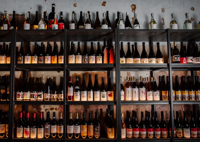 Paski Vineria Popolare, Darlinghurst - Credit: Paski Vineria Popolare Wine bottles on a shelf, Paski Vineria Popolare, Darlinghurst - Credit: Paski Vineria Popolare