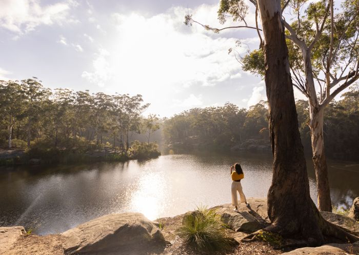 Woman enjoying a walk along the banks, Lake Parramatta, Parramatta