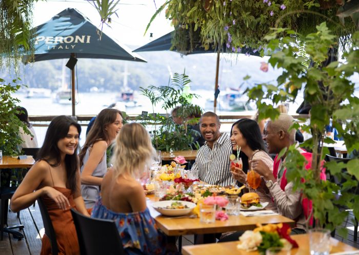 Friends enjoying food and drink, The Waterfront Cafe and General Store, Church Point