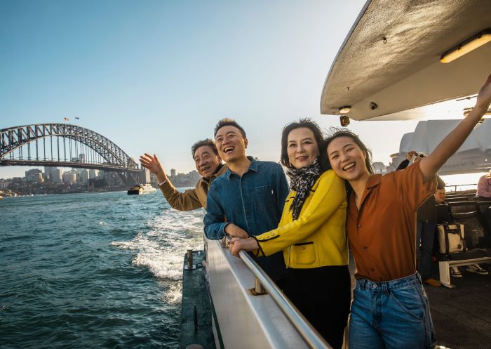 Family enjoying harbour views, Sydney Harbour Ferry, Sydney