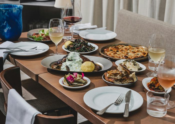 Table of dishes, Olympus Dining, Surry Hills - Credit: Nikki To