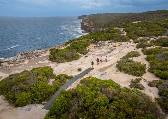 People hiking, The Coast Track, Royal National Park - Credit: John Spencer| DCCEEW