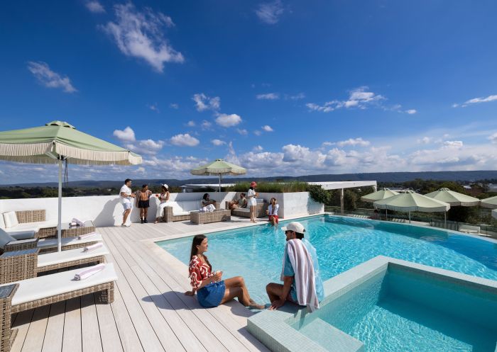 Friends relax by the pool, Theo’s Rooftop Bar, Penrith