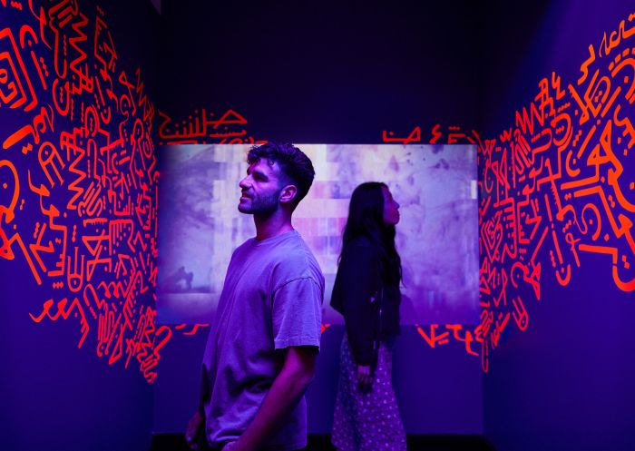 Couple visiting and viewing art, Bankstown Arts Centre, Bankstown - Credit: Alia Ali @studio.alia.ali | Artwork: The Red Star 2020/2024