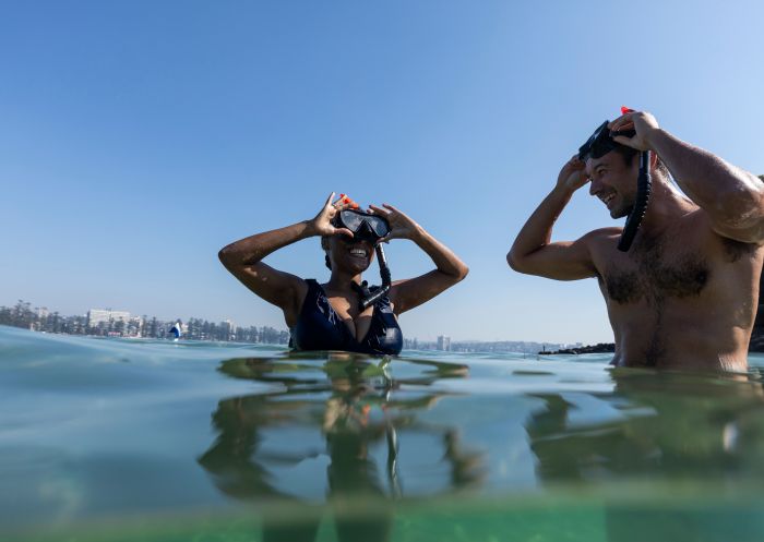 A couple enjoys snorkelling, Snorkelling Shelly Beach, Manly