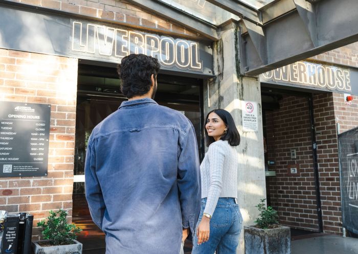 Couple walking into venue, Liverpool Powerhouse, Western Sydney