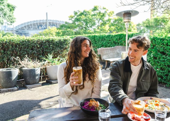Couple eating at cafe, Abbattoir Blues Cafe, Sydney Olympic Park