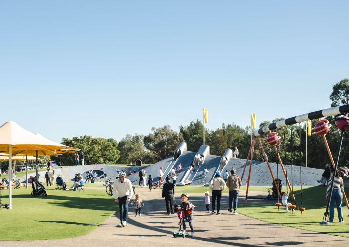 Groups and families enjoying a range of fun outdoor activities, Blaxland Riverside Park, Sydney Olympic Park