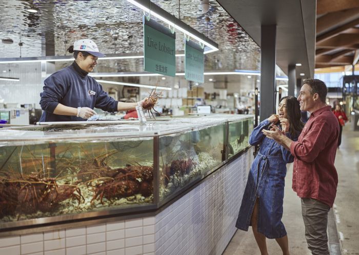 Couple buying at a store, Sydney Fish Market, Glebe
