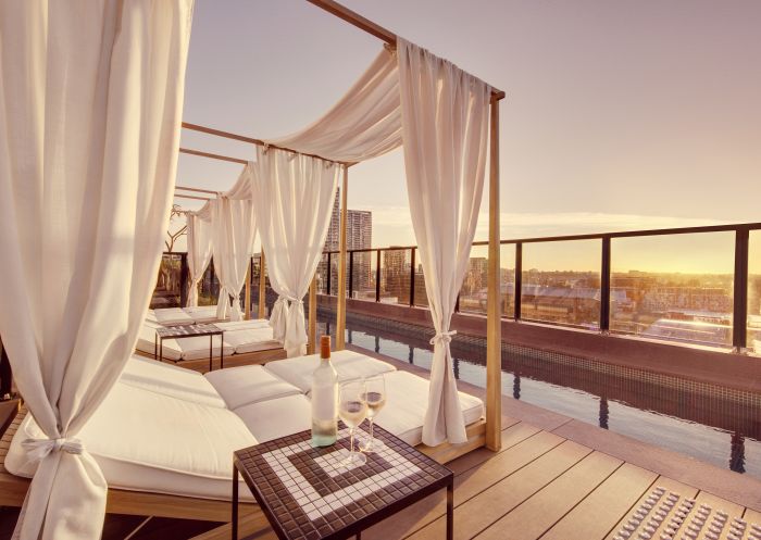 Lounge chairs at sunset, Vibe Hotel Sydney Darling Harbour, Sydney - Credit: TFE Hotels