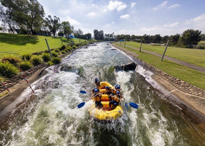 Friends enjoying a whitewater rafting experience, Penrith Whitewater Stadium, Penrith
