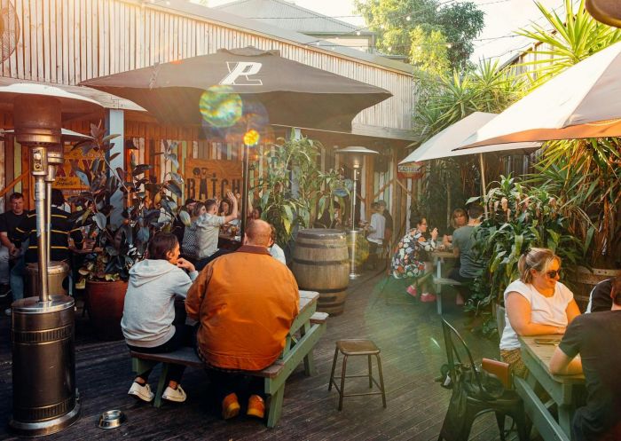 Beer garden with people sitting in the beer garden, The Erskineville Hotel, Erskinville - Credit: Solotel Pty Ltd