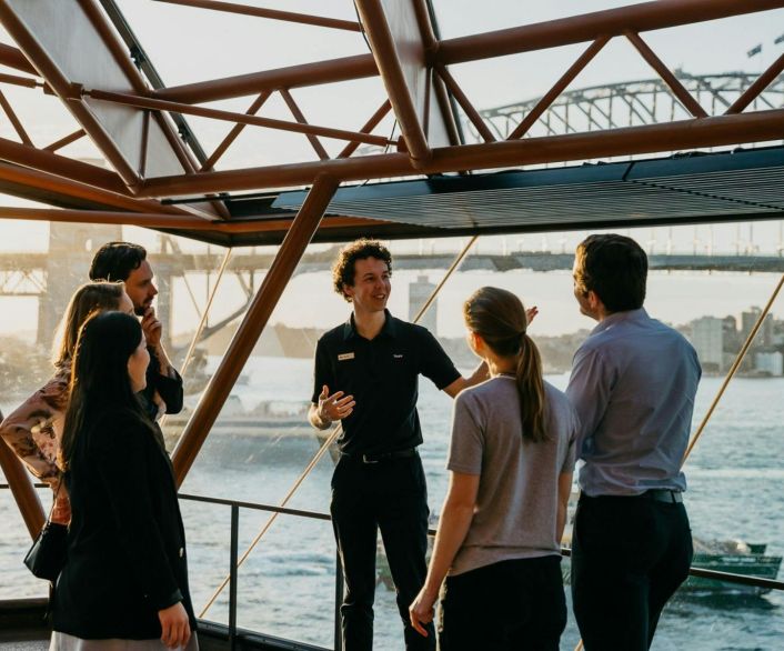 Tour guide showing group of people the Opera House, Sydney Opera House Tours. Sydney - Credit: Nikki To
