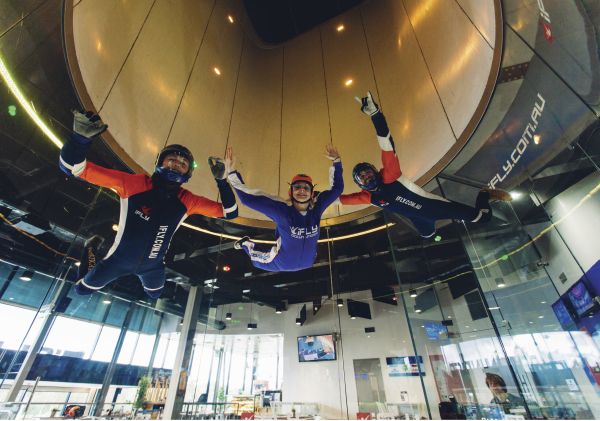 Woman enjoying an indoor skydiving experience in Penrith 