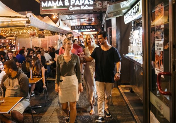 People dining at restaurants along Eat Street dining precinct in Parramatta